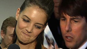 0823_katie_holmes_tom_cruise_tmz_article