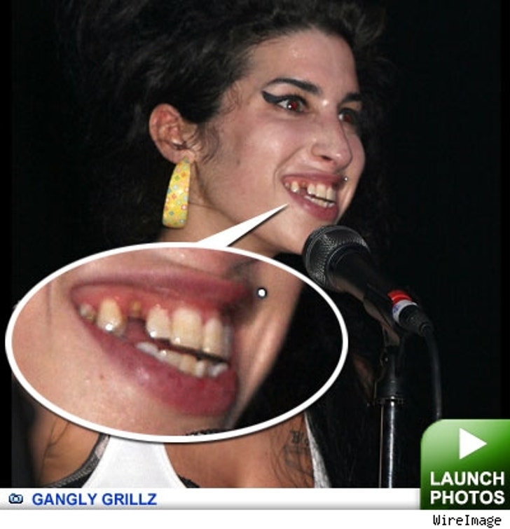 Frightening Fangs :: 0518_gangly_grillz_launch-1