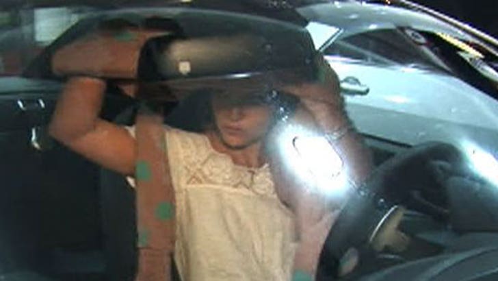 Britney -- Ashamed of Her Own Face?!