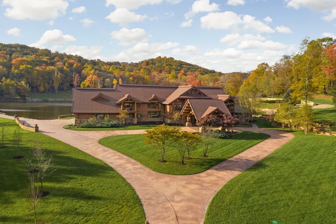 NASCAR legend Tony Stewart listed his ridiculously awesome Indiana ranch and it's got a $30 million price tag! This 20,000-square-foot estate sits on 415 acres in Columbus, IN -- less than an hour from Indianapolis -- and is built out of luxurious lodgepole pine. You can dive in the 9-acre stocked lake in the backyard or if you're a fan of hunting, this land is a licensed hunting preserve that has a bunch of elk, deer and more.